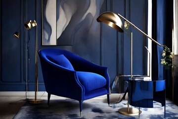 A deep cobalt blue armchair paired with a modern metallic floor lamp. - obrazy, fototapety, plakaty
