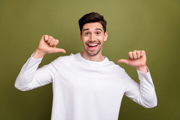 Photo of nice positive person toothy smile point fingers self himself isolated on khaki color background