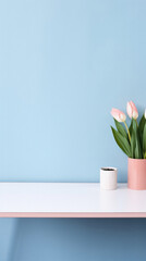 White shelf with pink tulips on blue wall background, copy space.