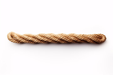 A length of rope is seen solo on a white surface.