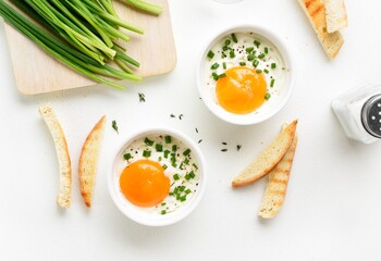 Eggs en cocotte (baked eggs) - obrazy, fototapety, plakaty
