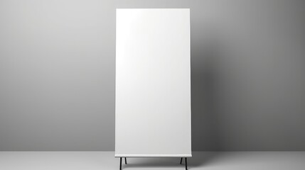 Blank roll up banner stand in grey room.