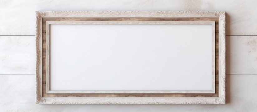 Vintage wooden frame on a light wall with a textured putty effect. Mockup.