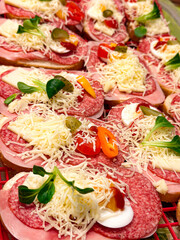 bread rolls with salami and cheese