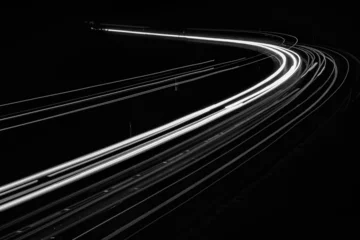 Papier Peint photo Lavable Autoroute dans la nuit white lines of car lights on black background