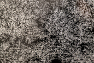 The texture of frost on frozen glass. Glass in winter