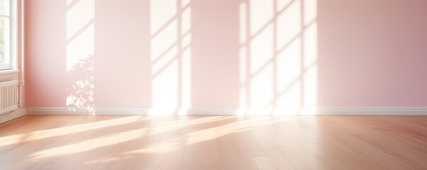 Light pink wall and wooden parquet floor, sunrays and shadows from window  - obrazy, fototapety, plakaty