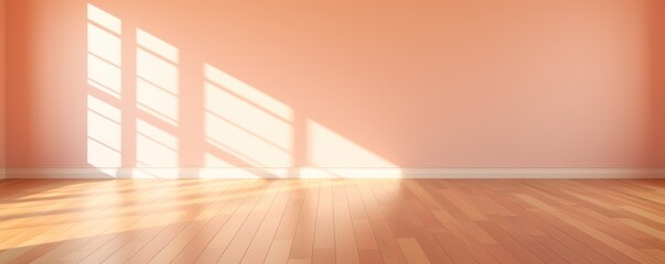Light peach wall and wooden parquet floor, sunrays and shadows from window 