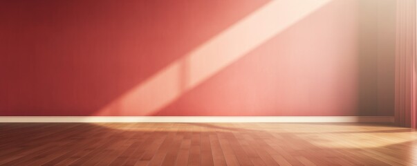 Light ruby wall and wooden parquet floor, sunrays and shadows from window