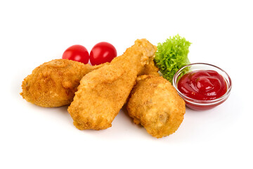 Fried Chicken in breadcrumbs with ketchup, isolated on white background.