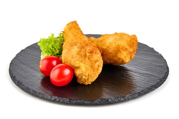 Breaded crispy chicken legs with ketchup, isolated on white background.
