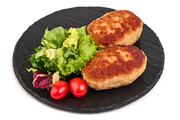 Roasted meatballs in breadcrumbs with mix salad, close-up, isolated on a white background.