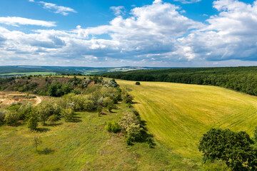 Fototapeta na wymiar Aerial view from drone of beautiful green countryside and at summer