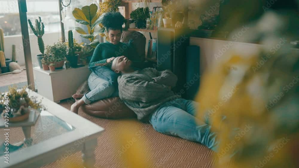 Poster Relax, home and couple playing with hair for bonding, happy relationship and embrace on floor. Dating, love and African man and woman in conversation, talking and chatting on living room floor