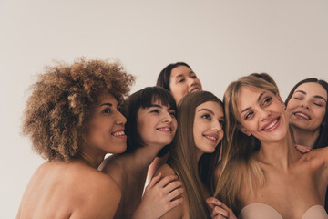 No filter studio photo of positive sweet women enjoying all beautiful bodies recording vlog isolated beige color wall background