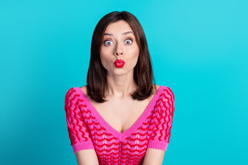 Portrait of funny pretty girl with stylish hairstyle wear pink top pouted lips kissing you staring isolated on blue color background - obrazy, fototapety, plakaty