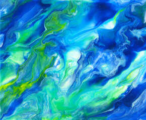 Bright colorful acrylic texture. Liquid flowing acrylic on canvas. Marble texture in rainbow colors. Hand made abstract artwork with white, blue, green and yellow colors.