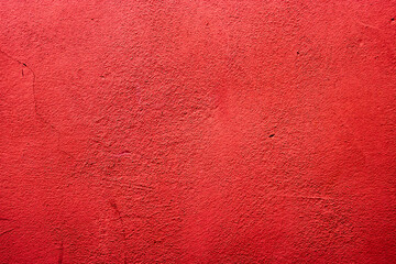 Bright red colored abstract wall background with textures of different shades of red