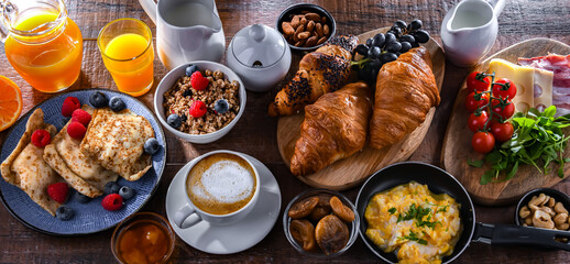 Breakfast served with coffee, eggs, cereals nd croissants