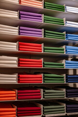 Clothing products on the shelf in a clothing store