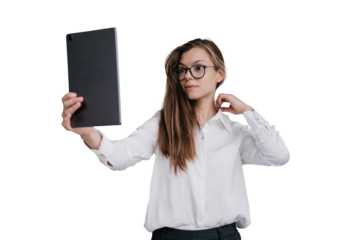 caucasian woman in white shirt holds tablet, uses like a mirror, males selfie against transparent background tries new spectacles. Beautiful Hispanic businesswoman preparing for video call