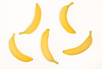 Bananas on a white background, top view.