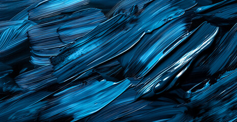 Blue oil paint on a black background. Handmade oil paint brush strokes isolated over the black...