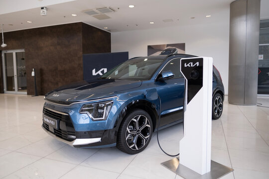 new hybrid electric car Kia NIRO HEV, South Korean hev in showroom, trends in use EV in contemporary Europe, latest technologies advancements in automotive industry, Frankfurt - November 9, 2023
