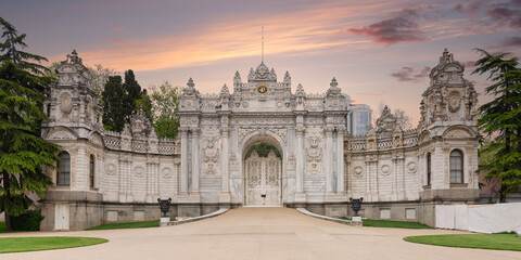 Sunset shot of closed gate leading to former Ottoman Dolmabahce Palace, or Dolmabahce Sarayi,...