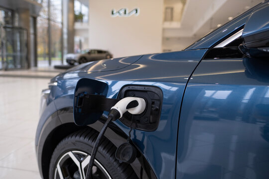 new hybrid electric car Kia NIRO PHEV, South Korean hev in showroom, trends in use EV in contemporary Europe, latest technologies advancements in automotive industry, Frankfurt - November 9, 2023