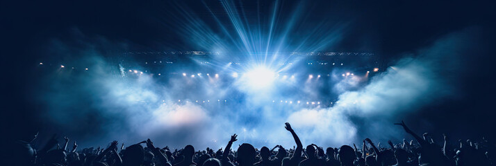 Energetic live music concert with a crowd of fans cheering and dancing under the glow of stage lights. - obrazy, fototapety, plakaty