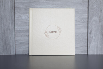 wedding or family photoalbum isolated on gray. Stylishphoto book. beige photo album with  cover ...