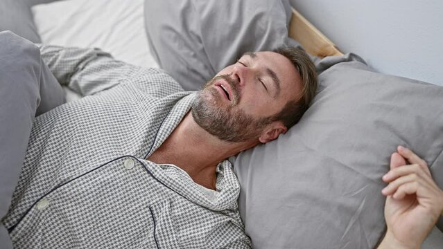 Middle-aged bearded hispanic man asleep in a comfortable bedroom, depicting tranquility and relaxation.