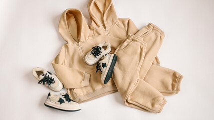 Children's tracksuits on a white background, advertising