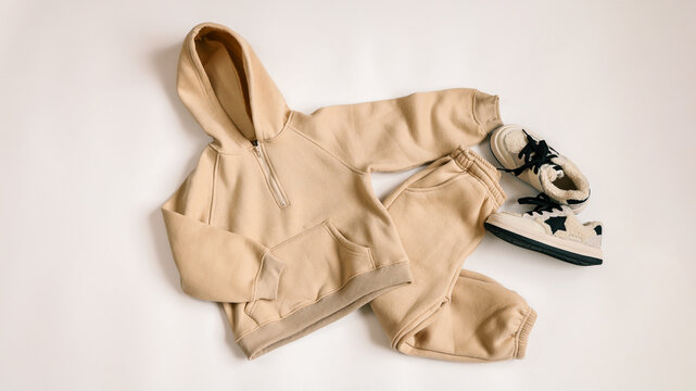 Children's tracksuits on a white background, advertising