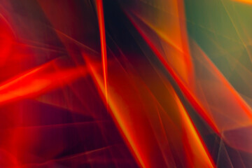 Abstract red and black background with a smooth gradient, sharp spiers, corners, lines and highlights.