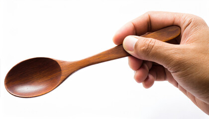 wooden spoon in hand
