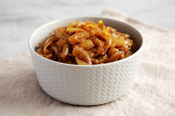Organic Caramelized Onions in a Bowl, side view.