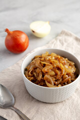 Organic Caramelized Onions in a Bowl, side view.