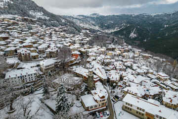 Aerial view of the city of Metsovo during winter time covered with snow