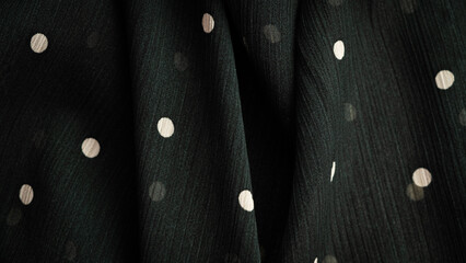 deep black fabric in white dots background copy space