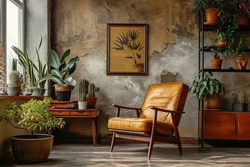  Retro interior design of living room with stylish vintage chair and table, plants, cacti, personal accessories and gold mock up poster frame on the beige wall. Elegant home decor. Template. © interior