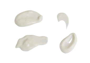 Smears of sour cream, smeared sauce on a white background close-up