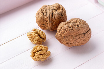 Walnut fruits. Whole shell and peeled kernels. In shell and peeled