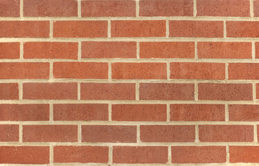 Close up of a red brick wall.