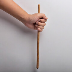 Wooden stick in a hand