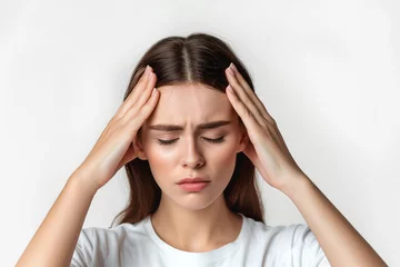 Poster Woman with migraine holding her head and experiencing pain on white background © GeorgeAI