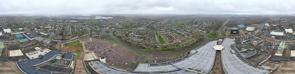Naklejka na ściany i meble Aerial Panoramic View of Corby Town of Northamptonshire, England United Kingdom on Cold and Cloudy Day of January 2024