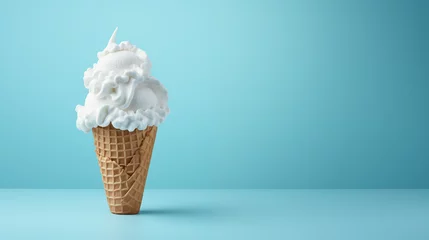 Fotobehang Cono de helado de nata  sobre un fondo azul claro © VicPhoto
