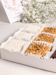 Dessert in a gift box is Bird's milk.